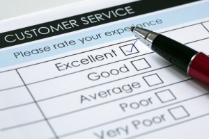 Customer service 'rate your experience' notepad with excellent checked