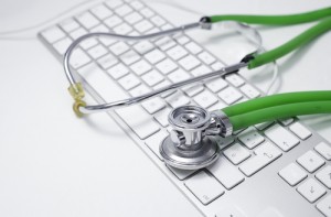 Stethoscope on a keyboard, representing server health monitoring solutions from UNICOM Engineering