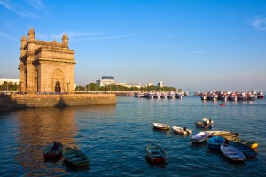 Picture of a building by water with boats in India