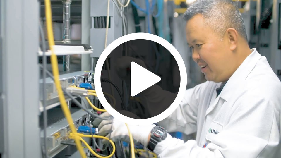 UNICOM Engineering technician is testing an integrated system.