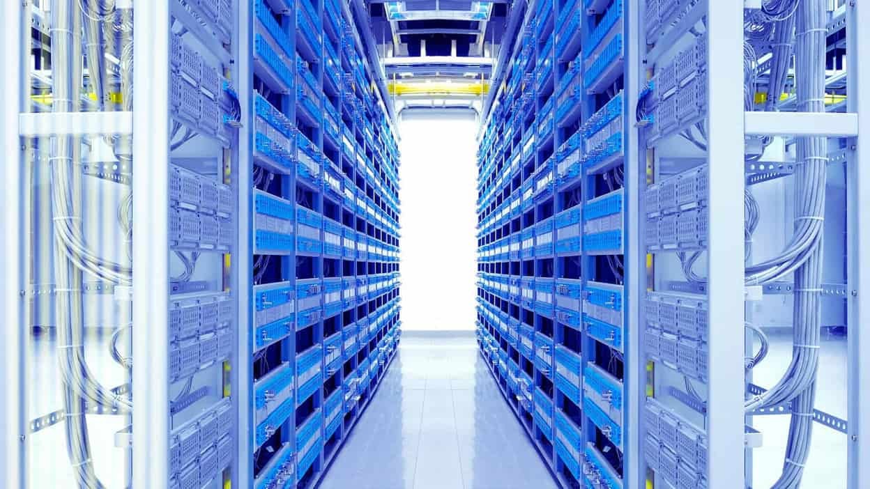 View down a blue server room