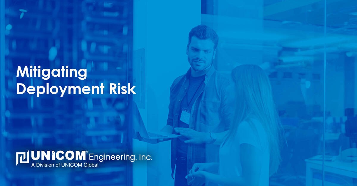 A picture of businessmen communicating and technology with a blue filter that says 'Mitigating Deployment Risk' with UNICOM Engineering's logo