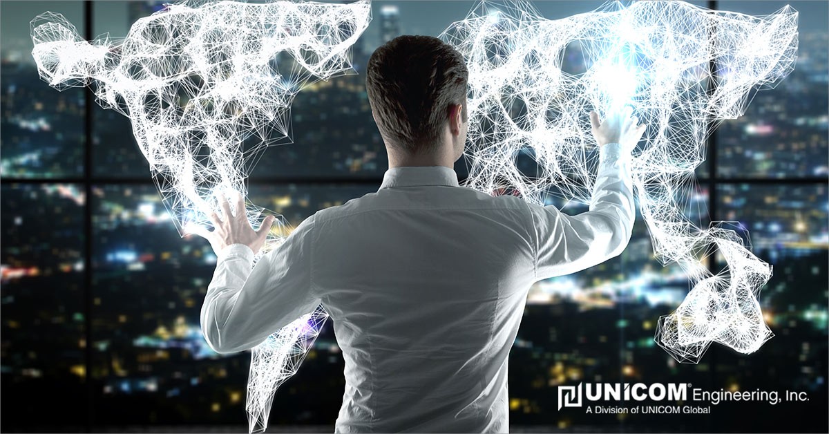 Businessman using his hands to form white connecting figures with a city in the background