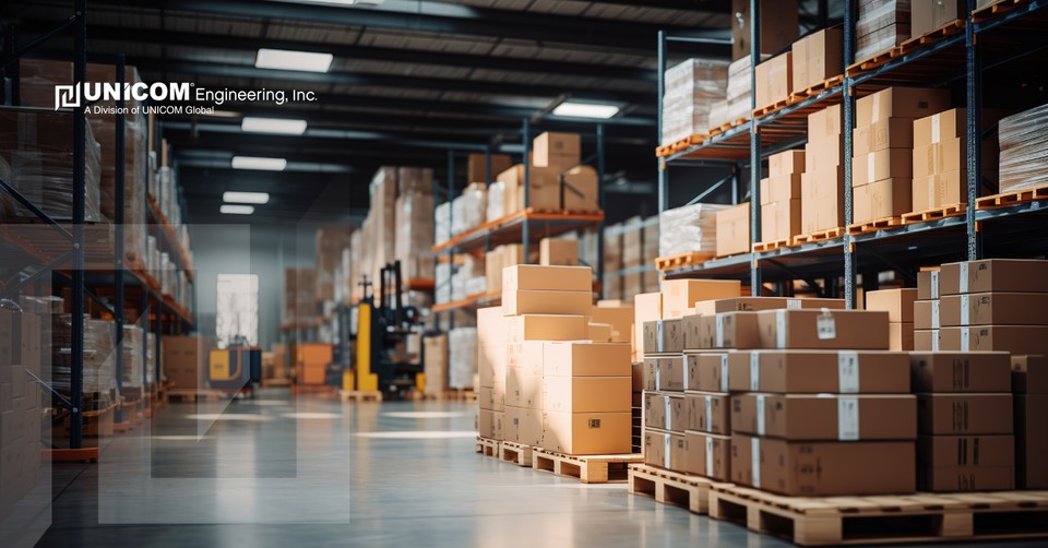 man viewing logistics on a tablet in a warehouse